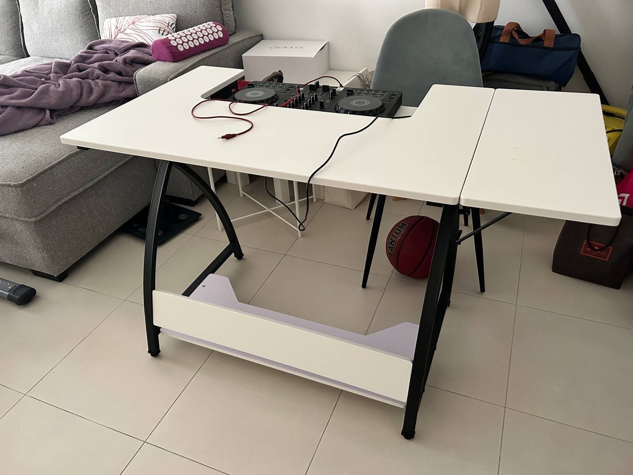 DJ mixer on table (KOMATIC) — Dubai, UAE