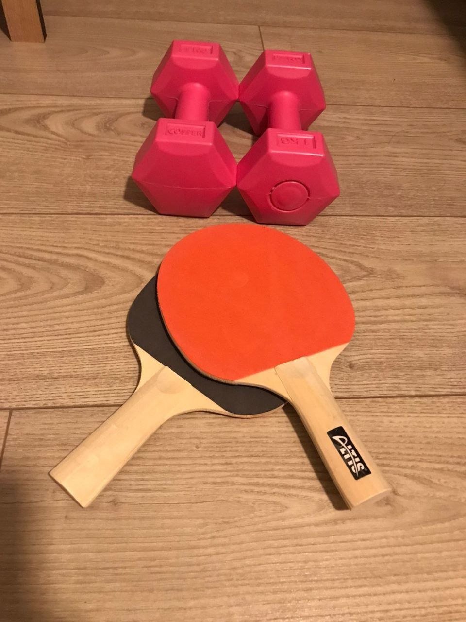 Dumbbells and table tennis paddle — Antalya, Turkey Dumbbells and table tennis paddle — Antalya, Turkey