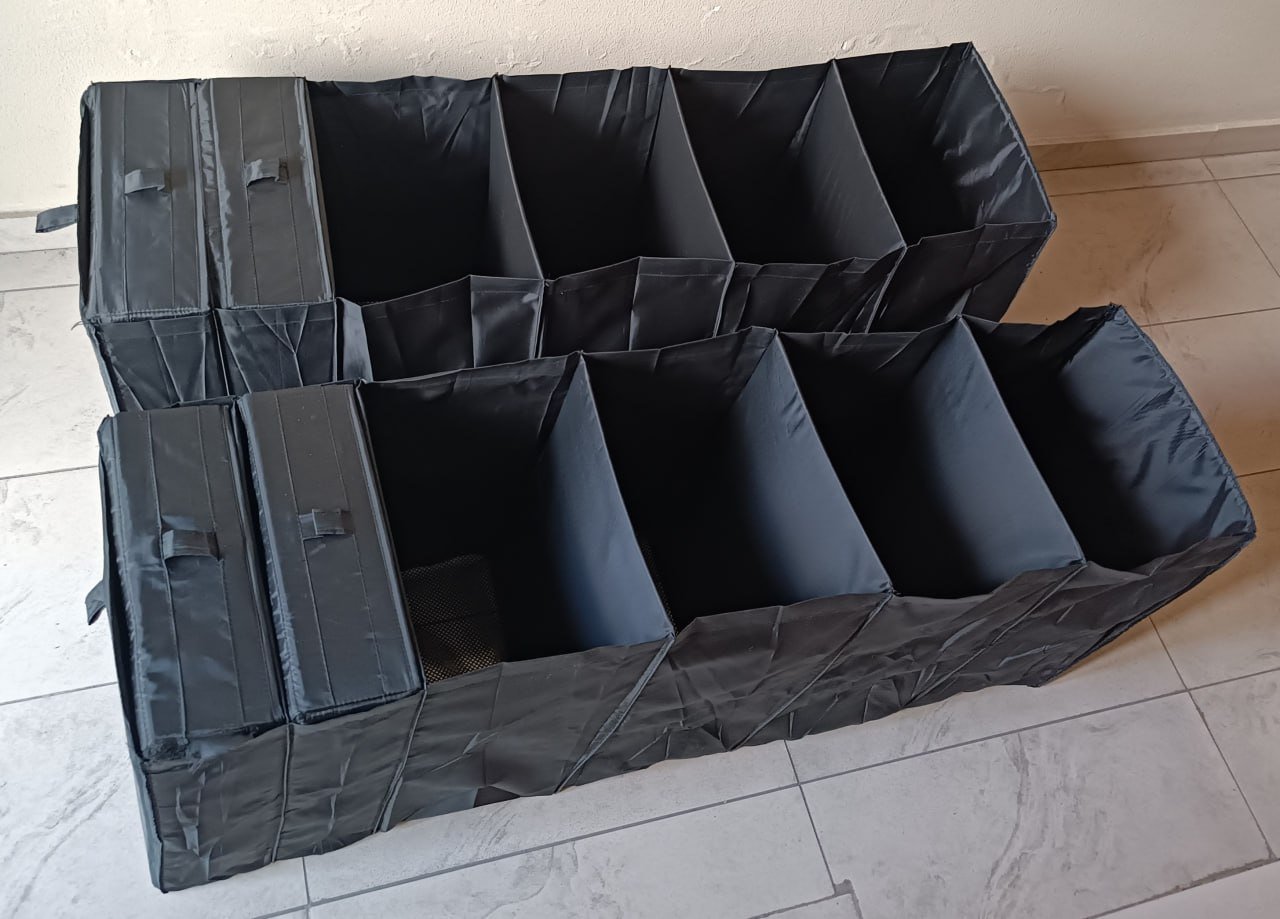 IKEA SKUBB closet organizer (2 modules + 4 drawers) — excellent (minor tear on one drawer loop and split seam on the front