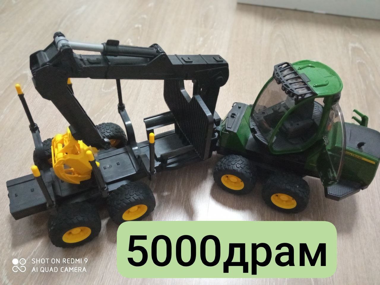 John Deere 1210E tractor with manipulator and logs, 5000 dram — Yerevan, Armenia