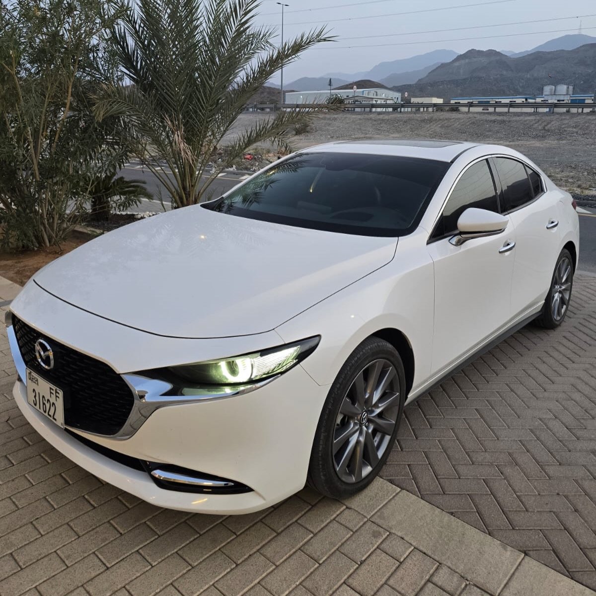 Mazda 3 2.0 2025, 13k km, carbon, leather, Android — dealer condition — Dubai, UAE