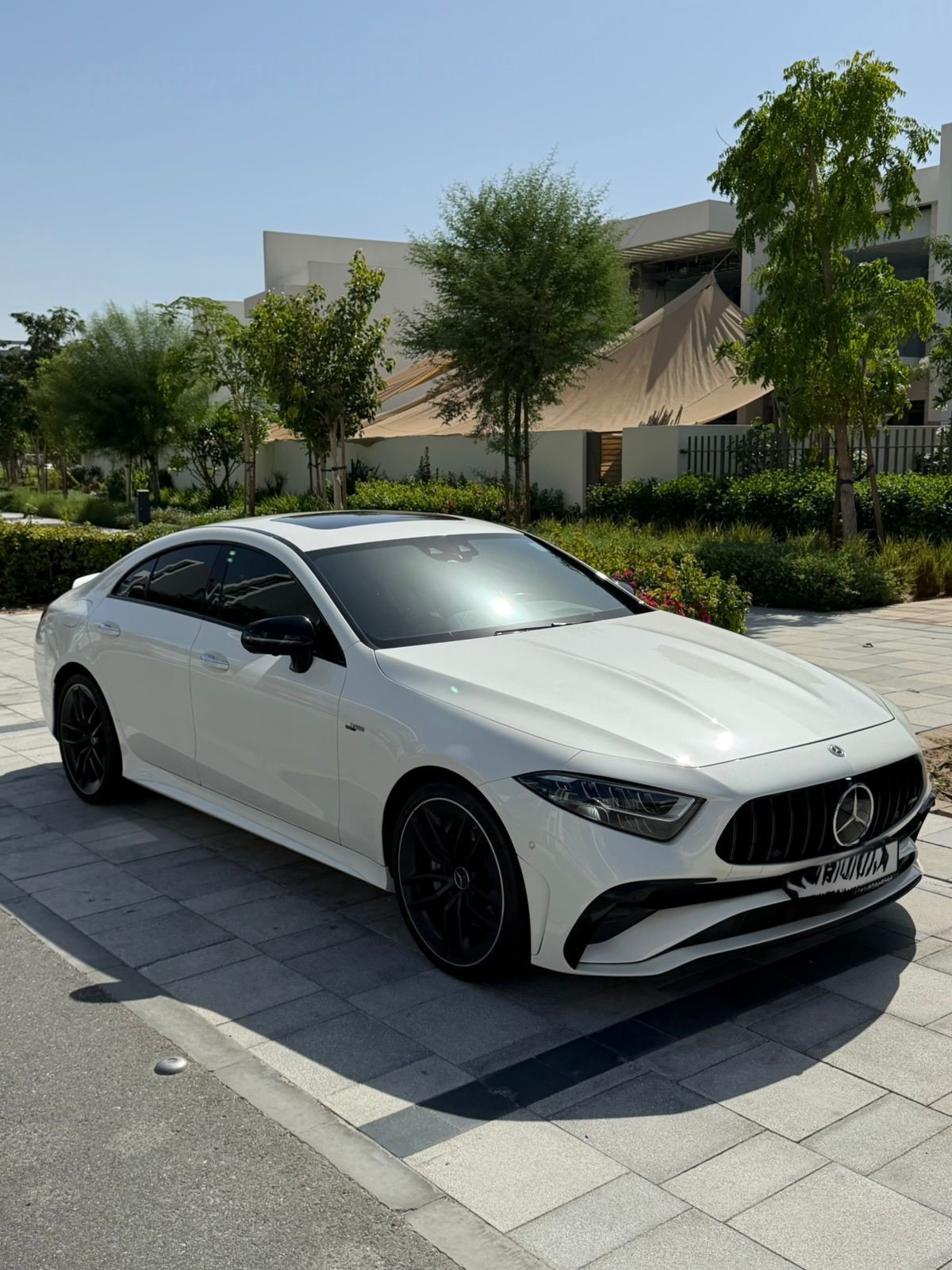 Mercedes CLS 53 AMG 2023 white red interior — Dubai, UAE Mercedes CLS 53 AMG 2023 white red interior — Dubai, UAE