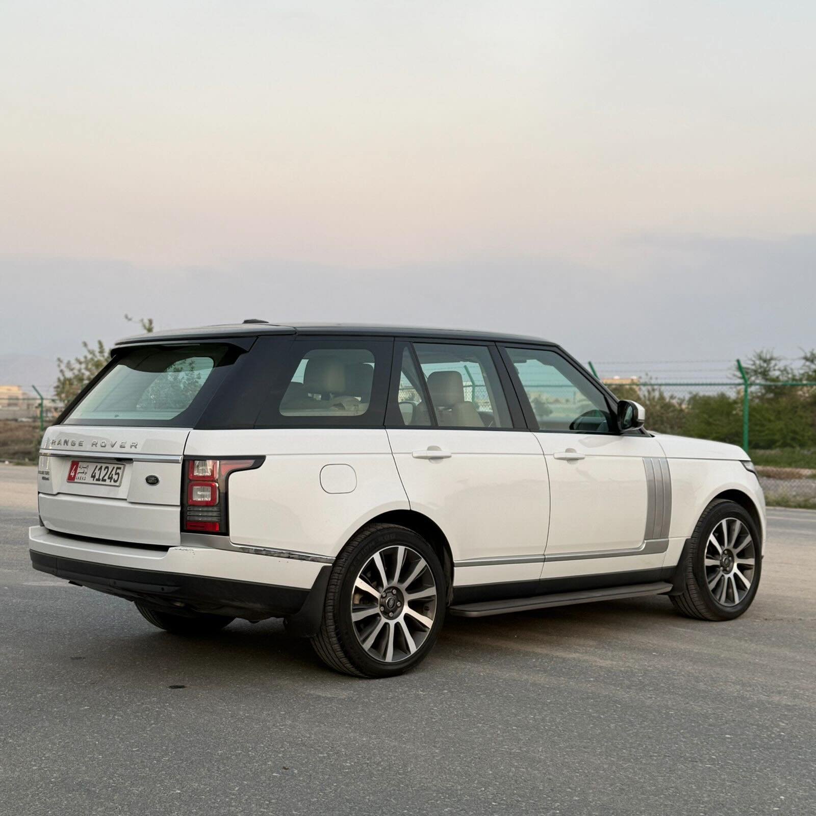 Range Rover Supercharged 2015 white, beige interior — no paintwork, no accidents — Dubai, UAE
