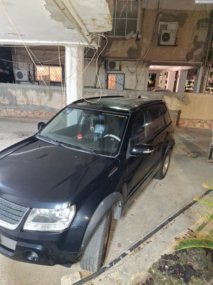 Suzuki Grand Vitara 2009 black automatic 2.4 — Tel Aviv, Israel