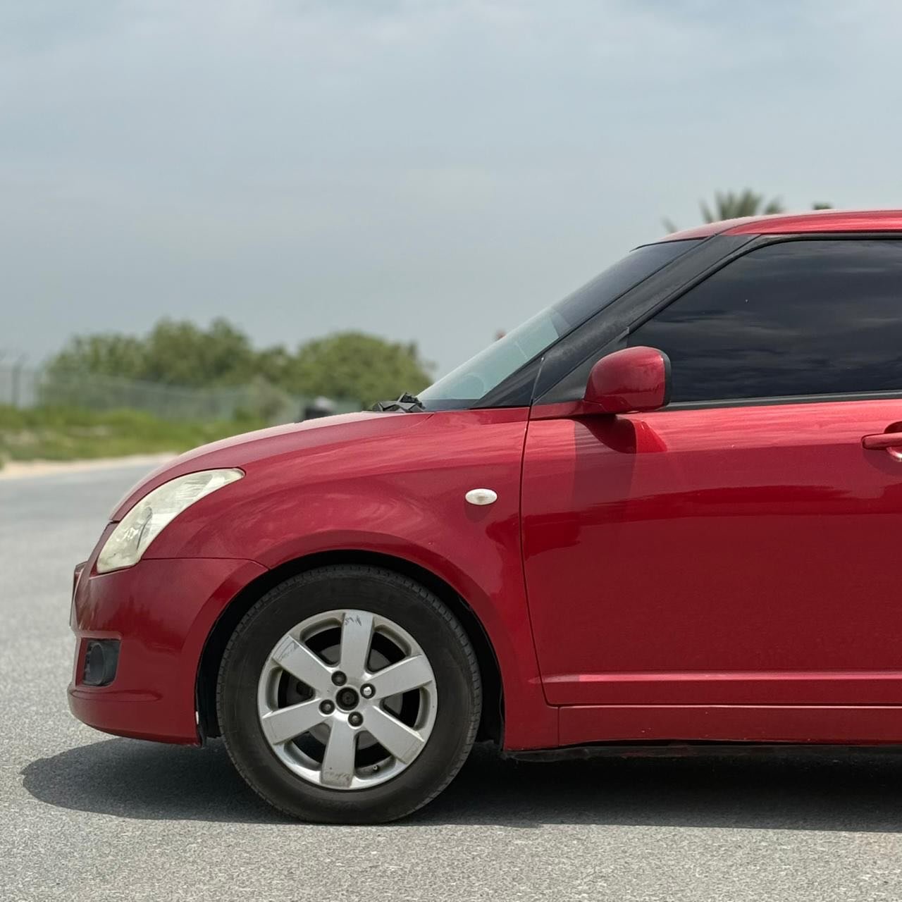 Suzuki Swift 2010 красный, автомат, Gulf, РАЭ