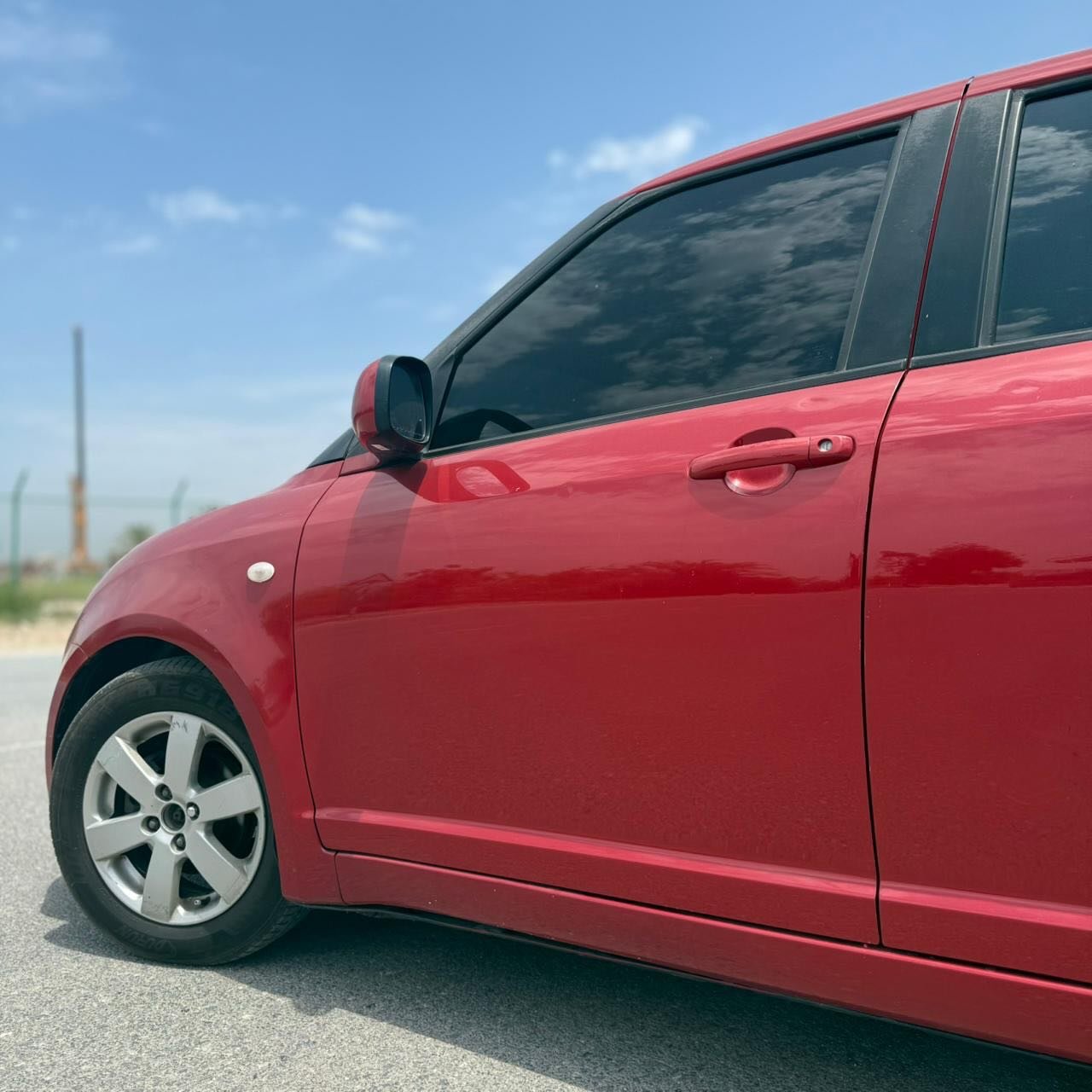 Suzuki Swift 2010 красный, автомат, Gulf, РАЭ — Дубай, ОАЭ