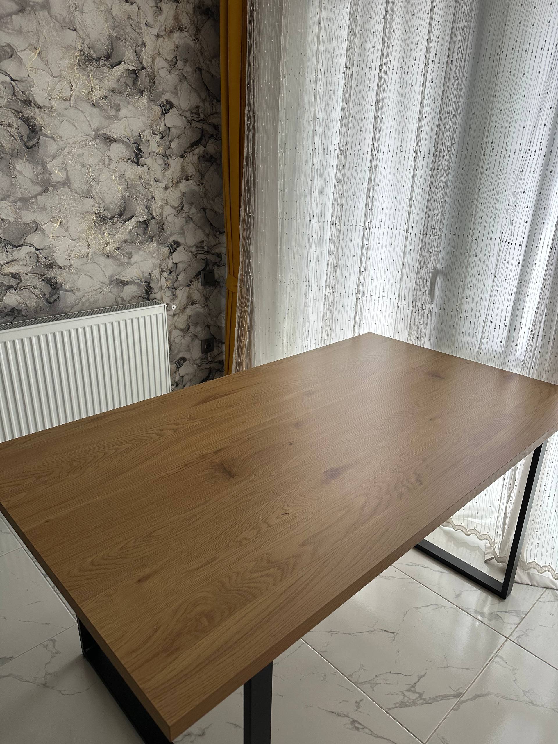Wooden table with black metal frame — Batumi, Georgia
